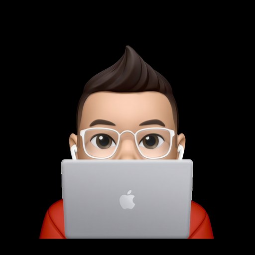 Erfan's Memoji peeking over a laptop